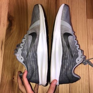 Grey Nike running sneakers